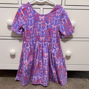 Rufflebutts Purple and Pink Bow Pattern Kids Dress with pockets